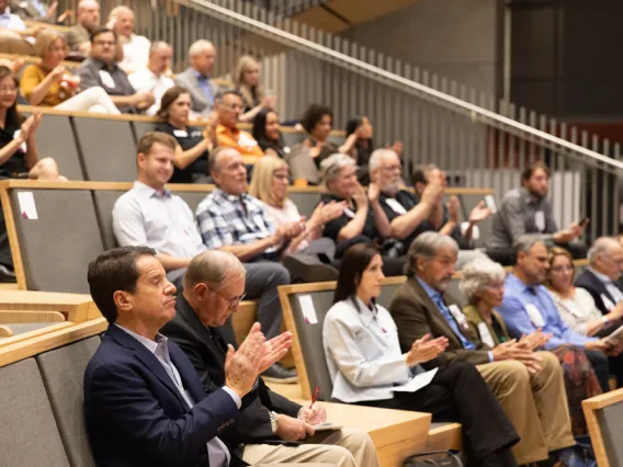 The crowd in their seats at The HSIB Forum.