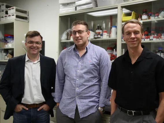 The Iluminos team in the lab: Chris Hulme, James Foley, and Travis Dunckley. 