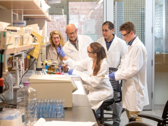 Floyd "Ski" Chilton (second from left) and his lab team examine how genetic and epigenetic variations interact with human diets to drive inflammation and inflammatory disorders, as well as psychiatric and developmental disorders.