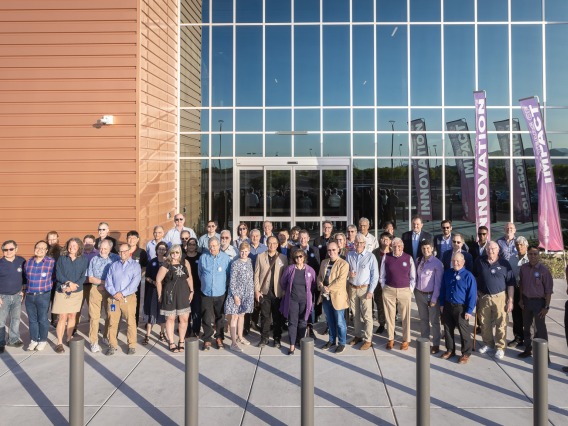 Group shot of University of Arizona inventors in front of the TLA office at The Refinery at The Bridges. 
