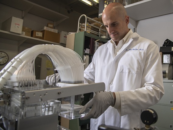 An image of John Streicher in the lab.