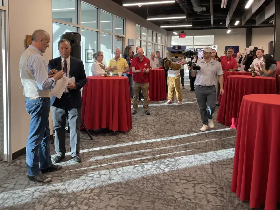 Doug Hockstad and Elliott Cheu address attendees at the TLA World IP Day celebration on April 25, 2024. 