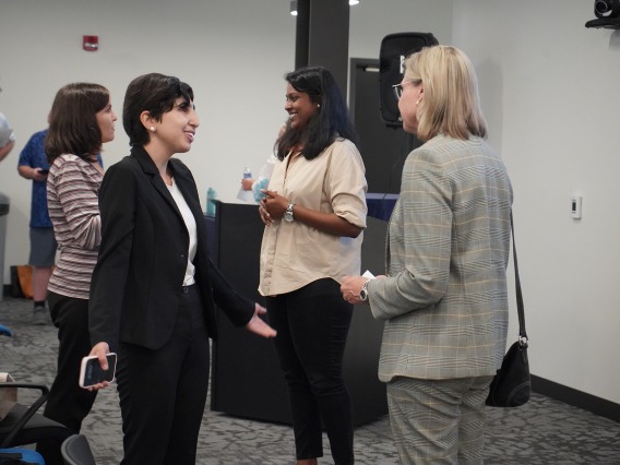 Student entrepreneur Sara Sheikhlary discusses her pitch with professor and BIO5 Institute director Jennifer Barton at Student Startup Demo Day, June 27, 2024.