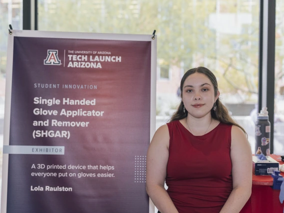 A woman at a table at the 2024 I Squared Awards