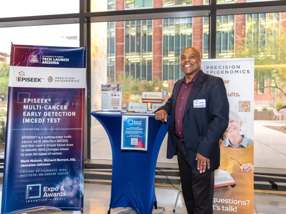 Mark Nelson of Precision Epigenomics at his team's table. 