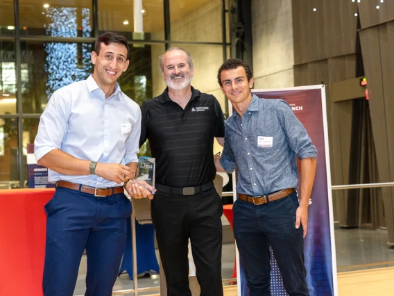 People's Choice award winners Itay Ozer and Nico Deshler with Doug Hockstad