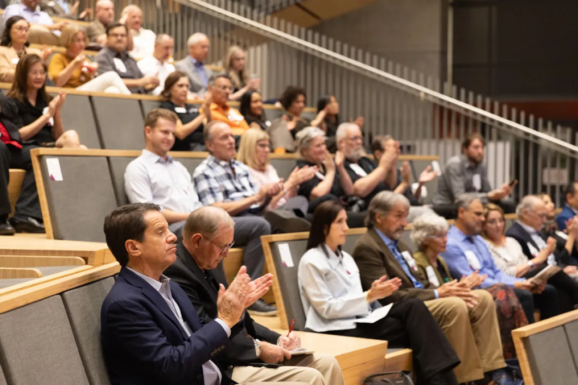 The crowd in their seats at The HSIB Forum.