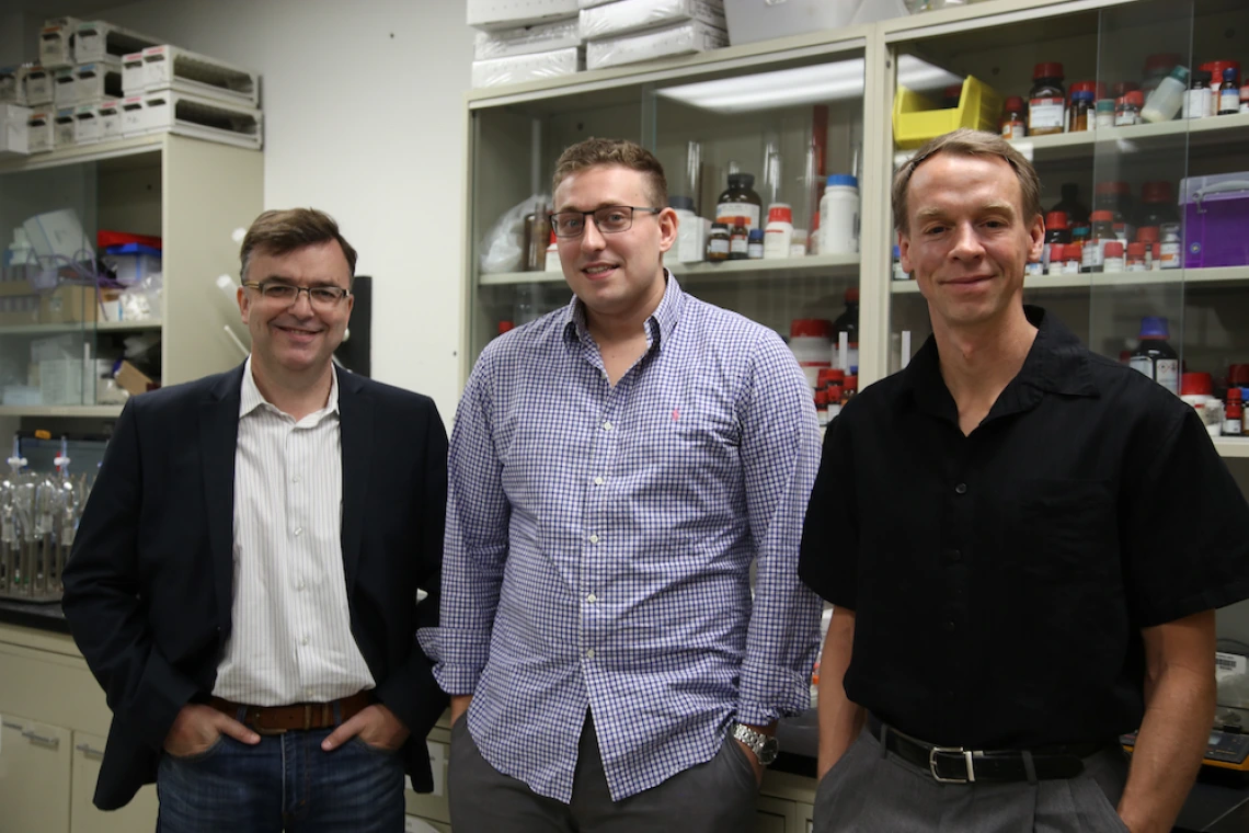 The Iluminos team in the lab: Chris Hulme, James Foley, and Travis Dunckley. 