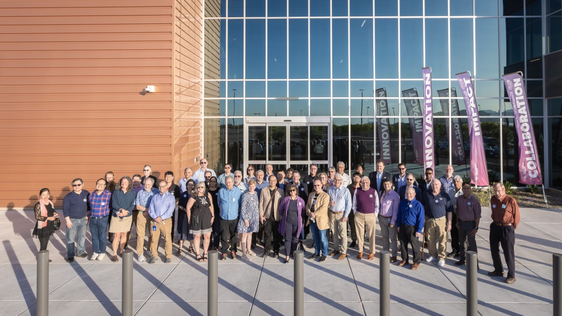 Inventors gather for a group shot in front of TLA's offices at The Refinery at The Bridges.