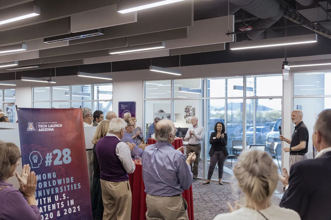 Doug Hockstad announces the UArizona's new patent ranking to the crowd. 