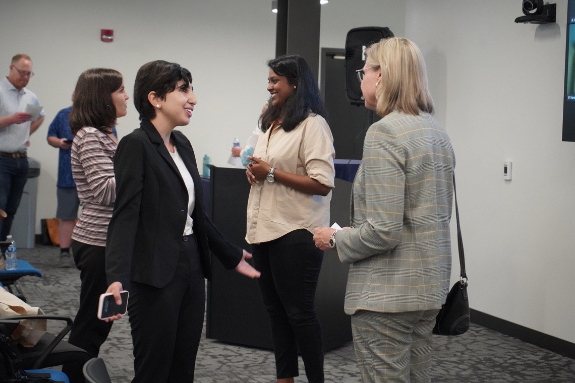 Student entrepreneur Sara Sheikhlary discusses her pitch with professor and BIO5 Institute director Jennifer Barton at Student Startup Demo Day, June 27, 2024.