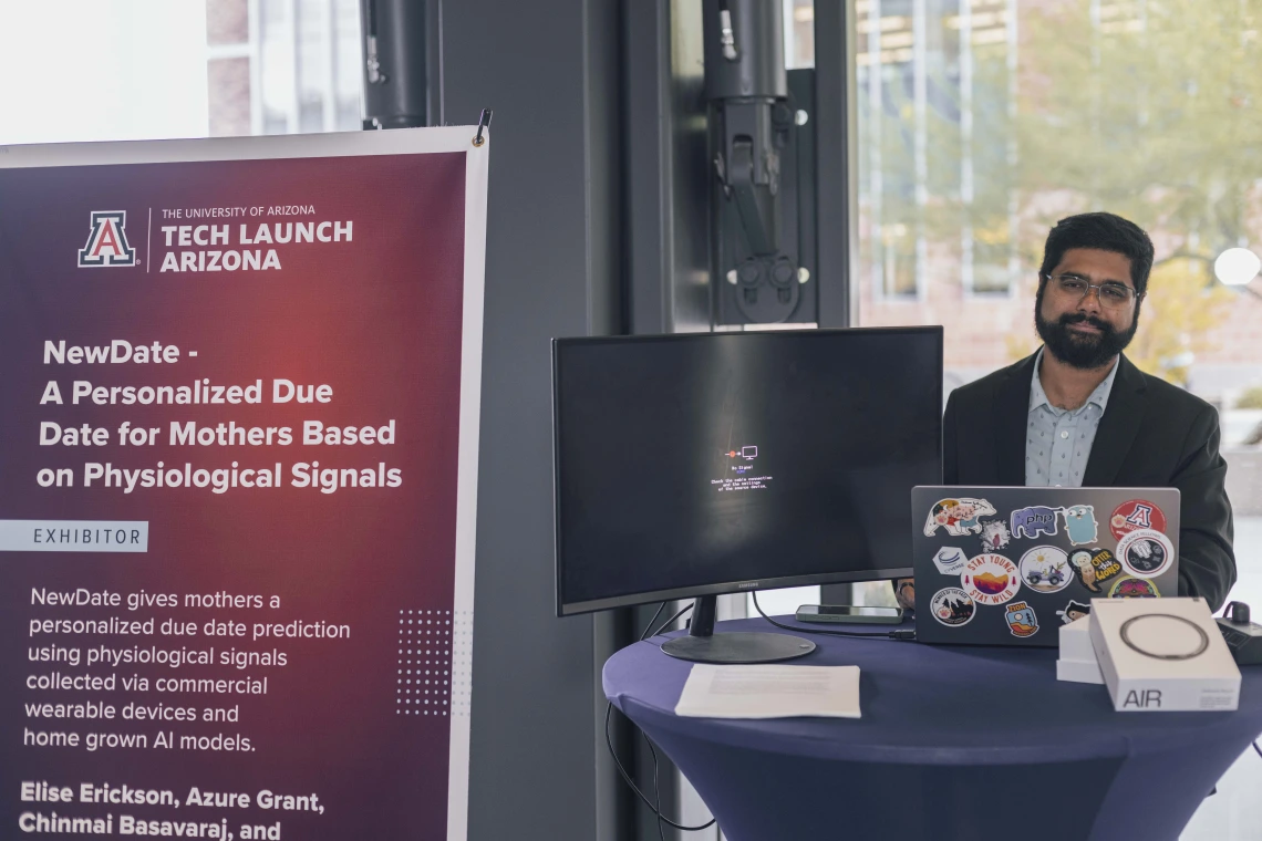 A man at a table at the 2024 I Squared Awards