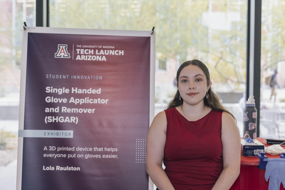 A woman at a table at the 2024 I Squared Awards