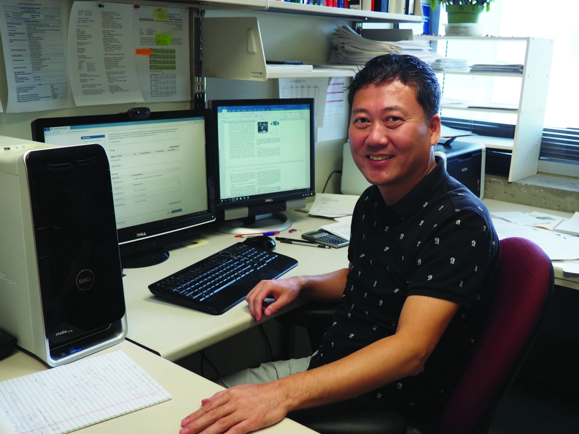 Jeong-Yeol Yoon in his office at his computer.