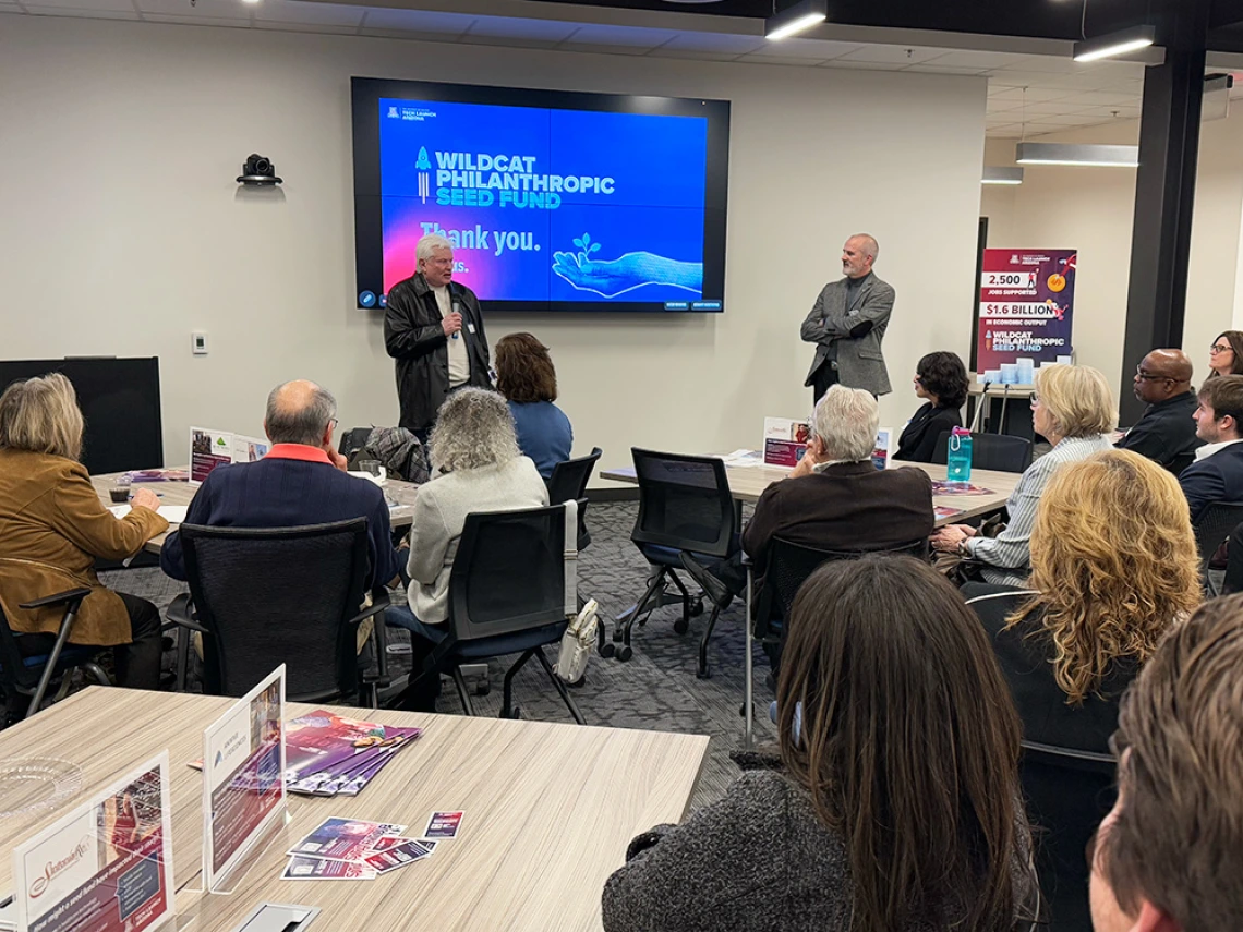 Left to right: Fletcher McCusker and Doug Hockstad speaking to the crowd gathered at the Jan. 30 event.