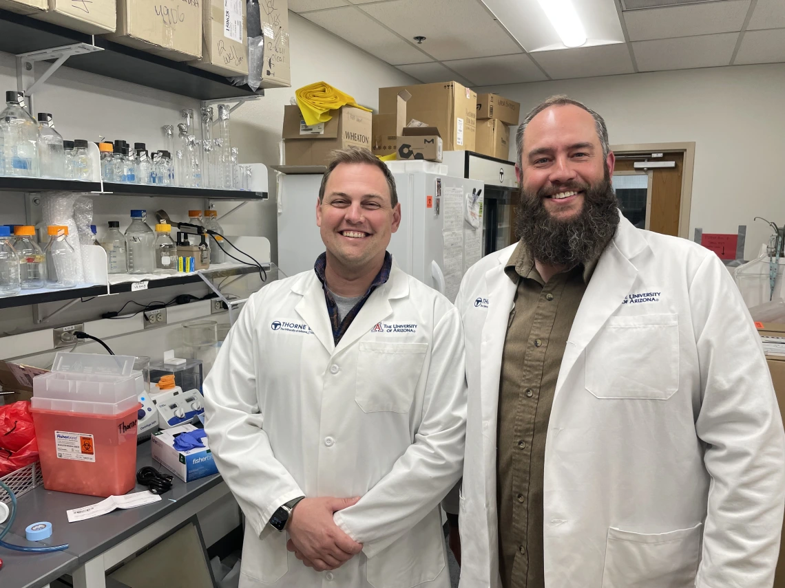 Left to right: Kelvin Pond and Curtis Thorne in their lab.