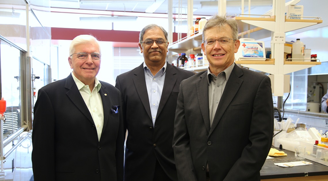 A photo in the laboratory of Reglagene's Laurence Hurley, Vijay Gokhale, and Richard Austin.
