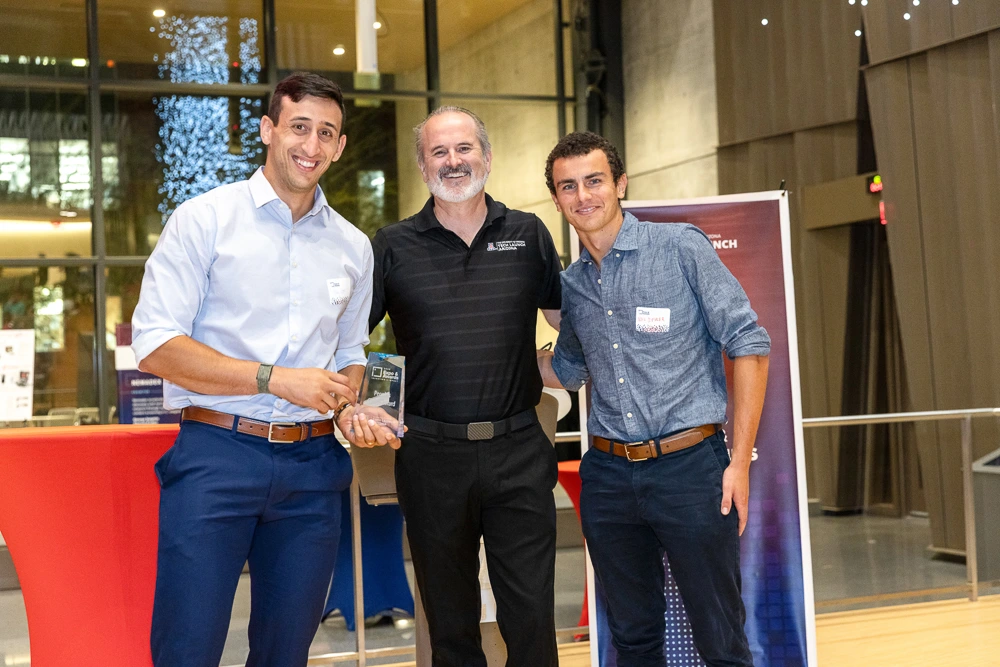 People's Choice award winners Itay Ozer and Nico Deshler with Doug Hockstad