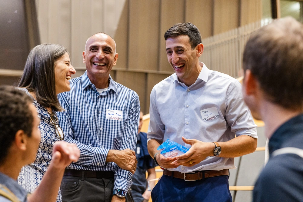 Student Innovator of the Year Itay Ozer celebrates with his parents. 