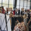 Crowds peruse the technology and startup expo at I-Squared 2024. 