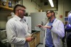 CarbeniumTech co-founders Thomas Gianetti and Joules Moutet talking in their lab.